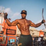 Strong man at Muscle Beach in Venice Beach, Los Angeles, California at sunset